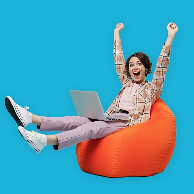 Person celebrating while using laptop.