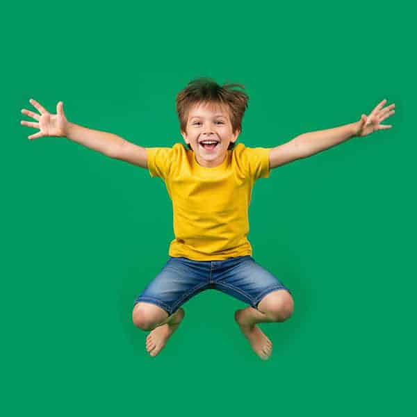 boy jumping for joy